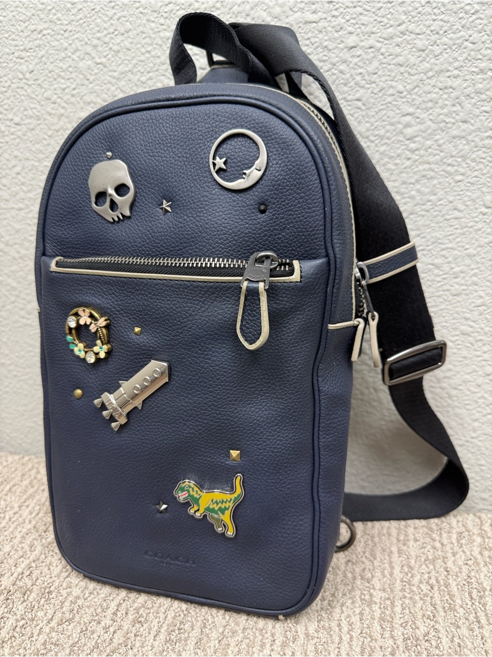Coach Storyblock Rexy Sling Bag with rocket, flowers, skull and moon